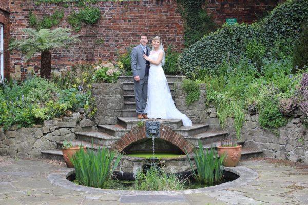 Bride and groom at the pond